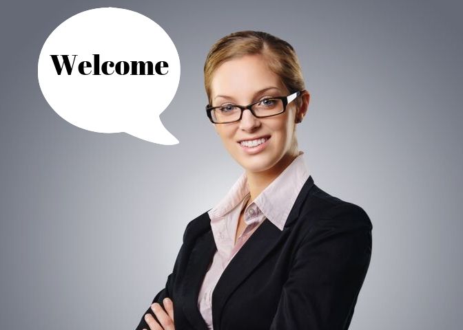 Image contains a woman saying "Welcome".